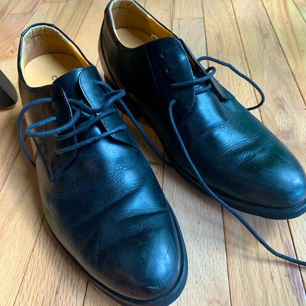 Mens black leather dress shoes with lift. Size 91/2- 10. Very good condition.